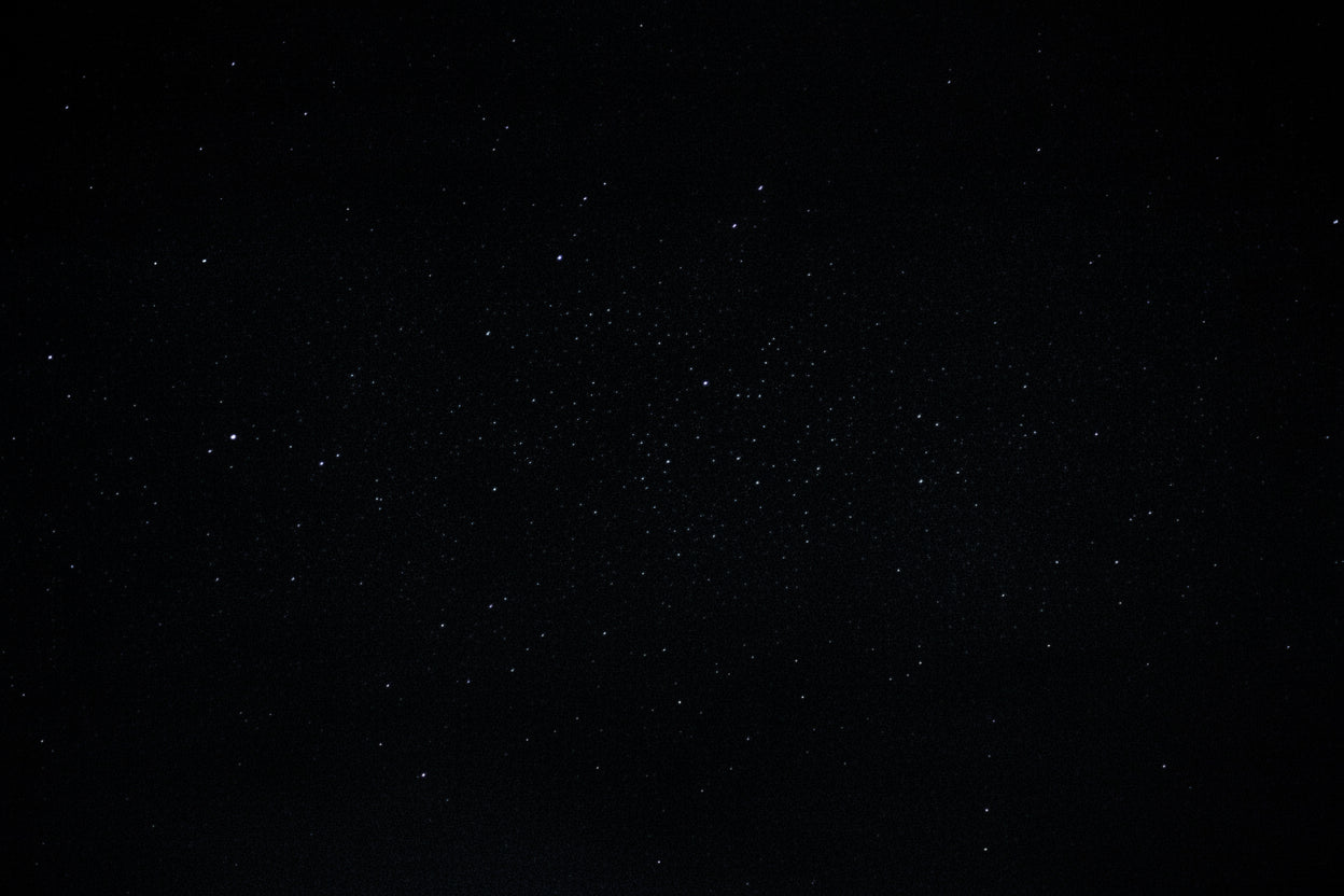 Black background with a single white dot